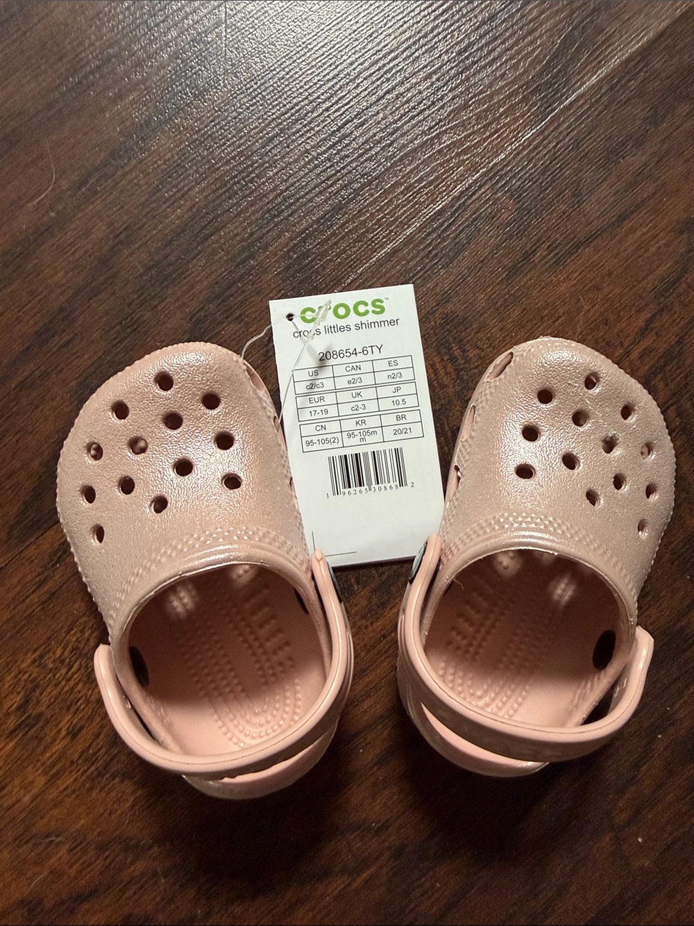 CROCS Kids' Littles Shimmer Clogs in Light Pink